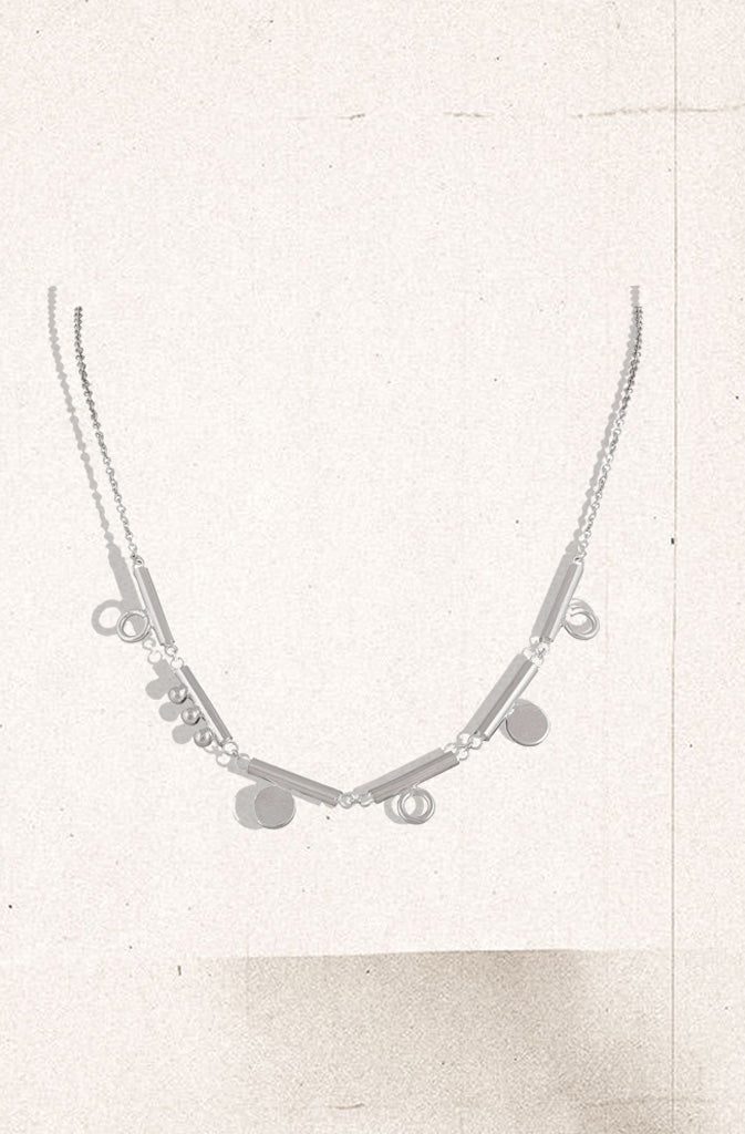 Bhava Necklace - SilverNecklaceBhava means emotions in Nepali. The multiple sections of the pendant denote a feeling different from another, an emotion different from the other; while they all beaGlobalistinaBhava Necklace - SilverGlobalistina