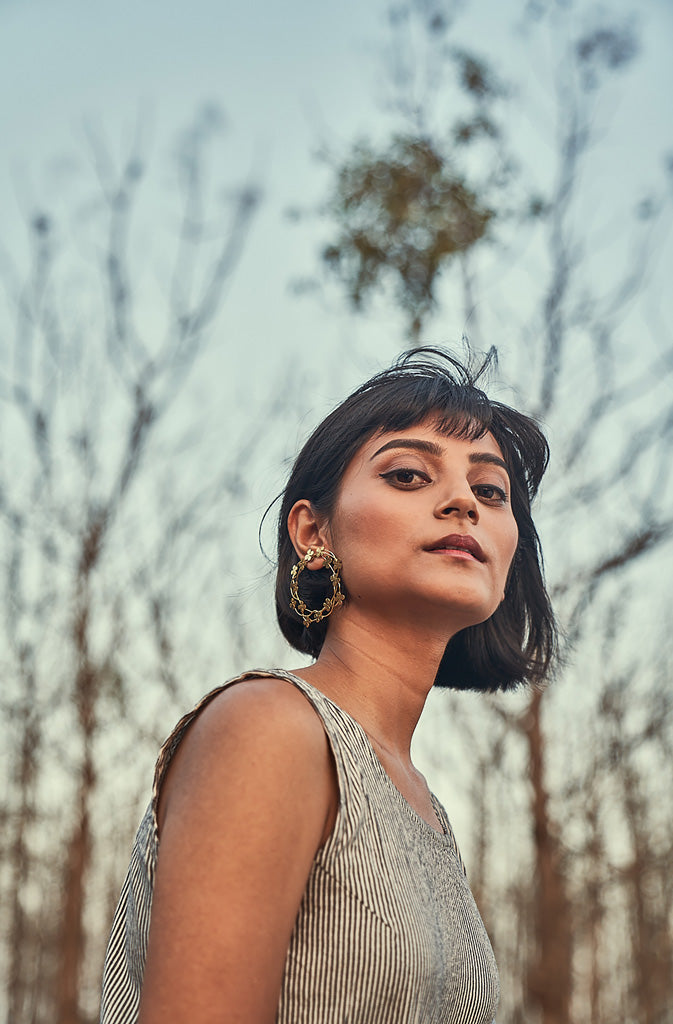 Big Coiled Hoops - SilverEarringsThese hooped earrings are from the collection “Deurali”, which typically means ''a pass between two valleys' and is a symbolic element of transition from one place tGlobalistinaBig Coiled Hoops - SilverGlobalistina