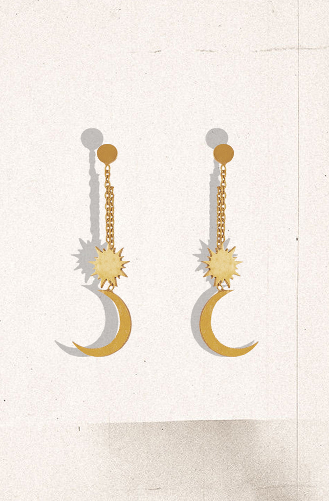 Chindra Surya EarringsEarringsAdorning the midnight sky, chandra (moon) and surya (sun) are symbols that resonate with everyone in Nepal and across the globe. Contemporary and light, these dangliGlobalistinaChindra Surya EarringsGlobalistina