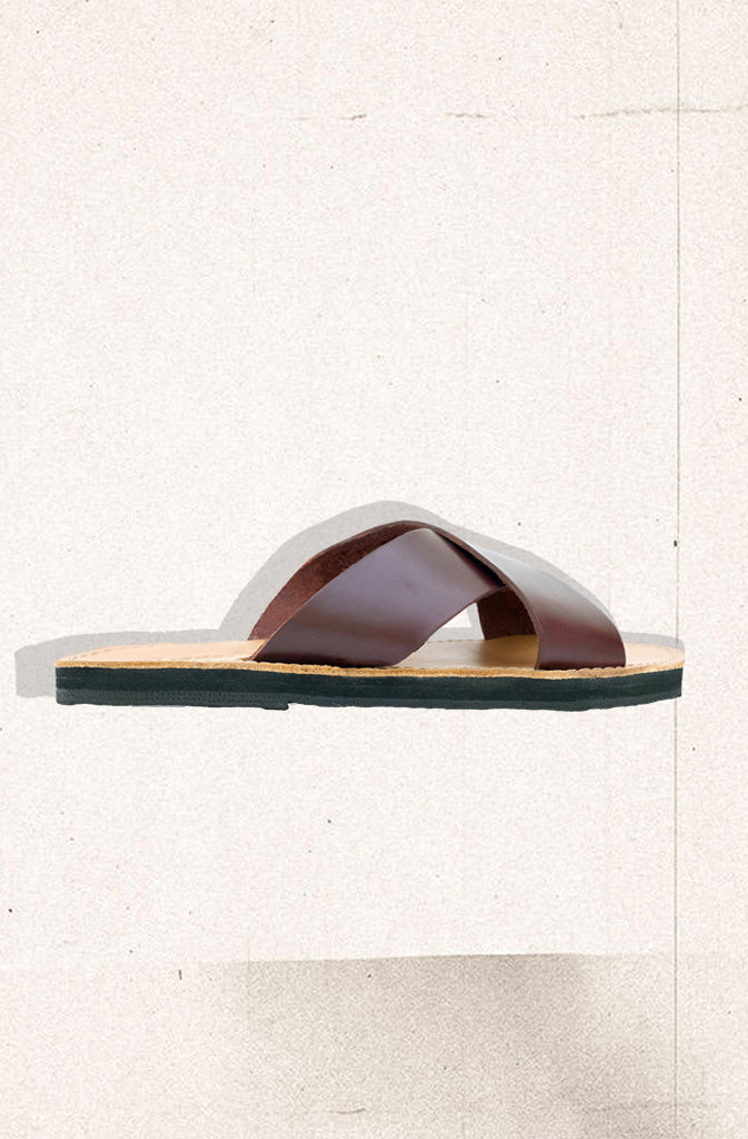 Costanza Slide SandalsSandalsGenuine leather slide sandal handcrafted by artisans from sustainable materials. The Constanza is designed for comfort and travel. Handcut and upcycled tire soles wiGlobalistinaCostanza Slide SandalsGlobalistina