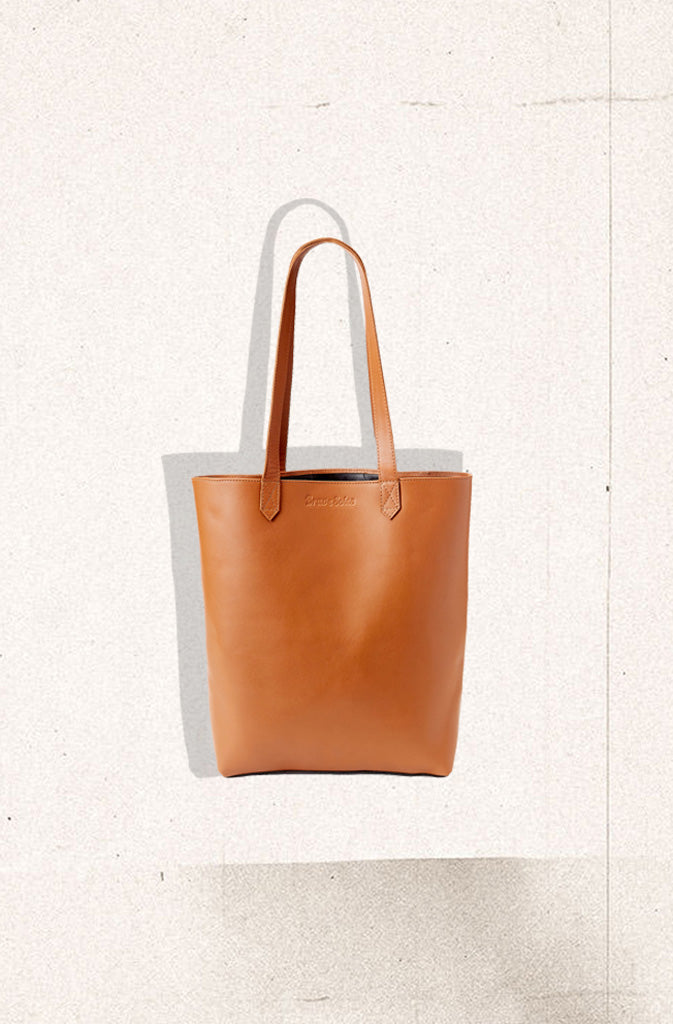 Florence Leather ToteTote BagClassic, sturdy tote bag made from ethically sourced and fairly traded leather. Things are kept simple, timeless and practical. No lining, just the velvety feel of tGlobalistinaFlorence Leather ToteGlobalistina