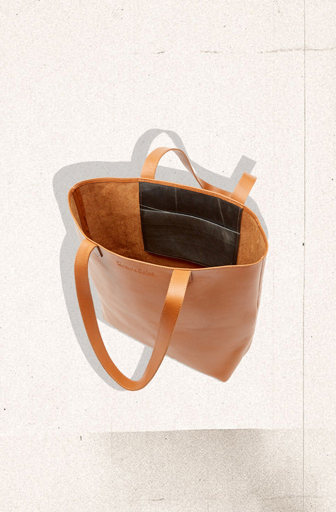 Florence Leather ToteTote BagClassic, sturdy tote bag made from ethically sourced and fairly traded leather. Things are kept simple, timeless and practical. No lining, just the velvety feel of tGlobalistinaFlorence Leather ToteGlobalistina