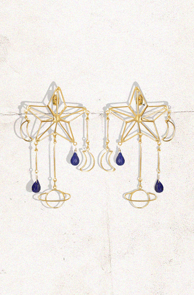 Lapis Star EarringsEarringsExtra light push-back earrings delicately depicting parts of our beautiful solar system, enriched with a splash of colour thanks to the lapis stones in a deep blue. GlobalistinaLapis Star EarringsGlobalistina