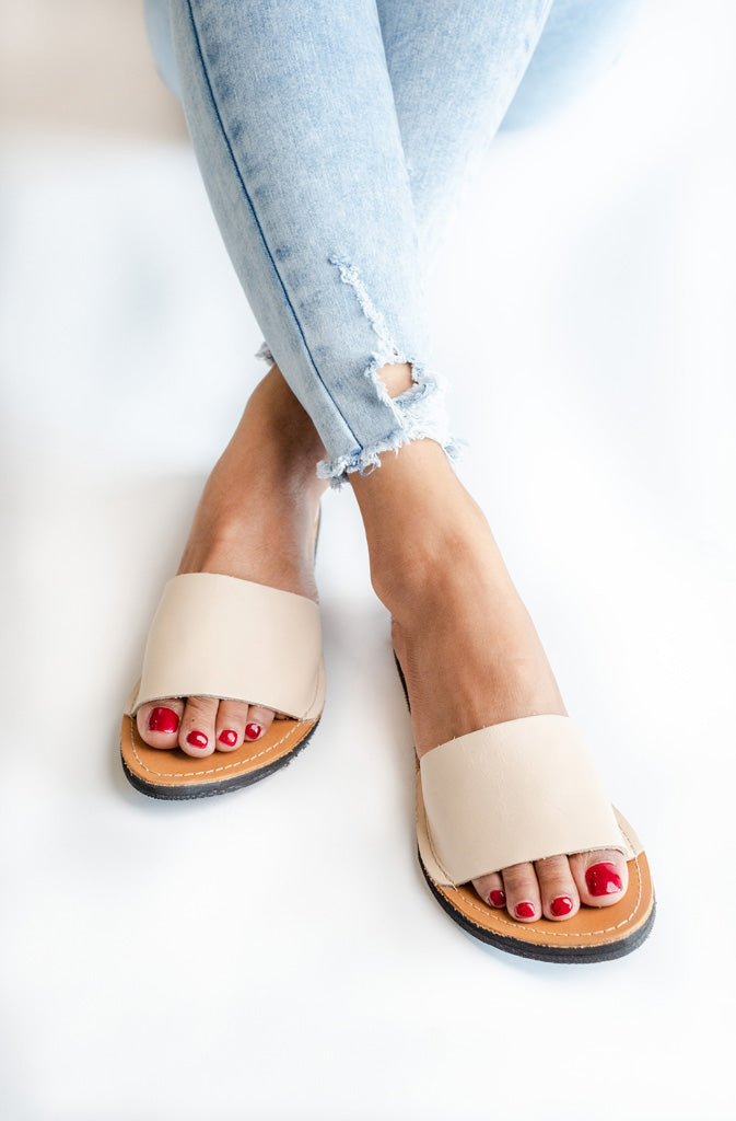 Linda Slide SandalsSandalsHandcrafted, simple and elegant leather slide sandal. Made with ethically sourced and fairly traded leather. Soles handmade from upcycled tires which sourced in the GlobalistinaLinda Slide SandalsGlobalistina