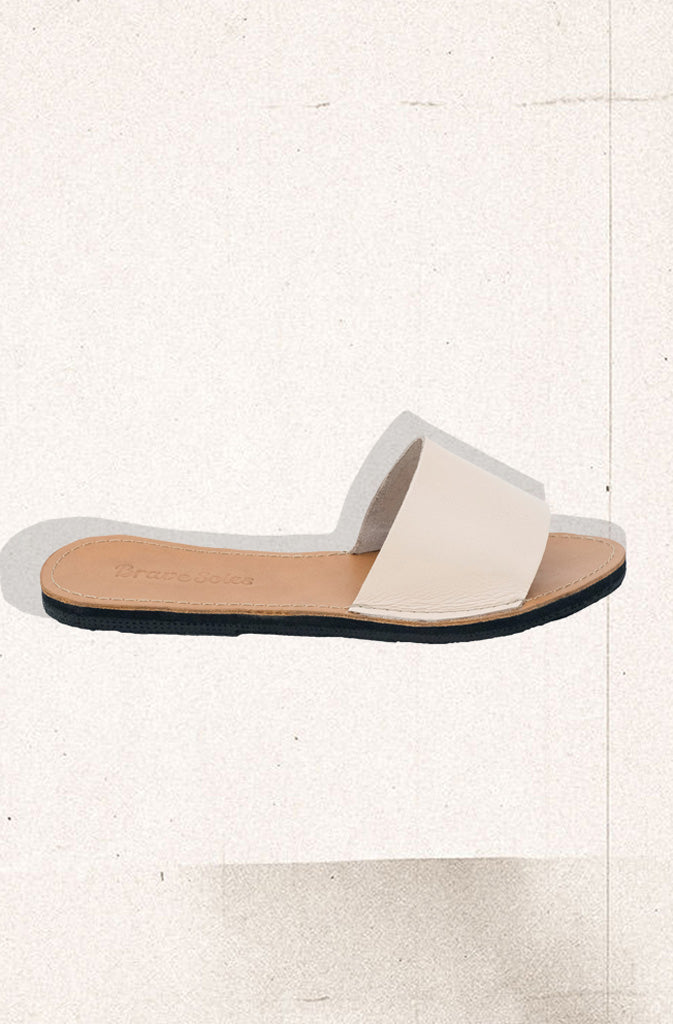 Linda Slide SandalsSandalsHandcrafted, simple and elegant leather slide sandal. Made with ethically sourced and fairly traded leather. Soles handmade from upcycled tires which sourced in the GlobalistinaLinda Slide SandalsGlobalistina