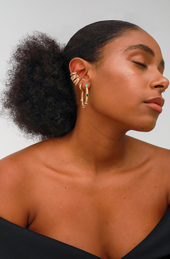 Mimosa EarcuffEarringsSet of 3 ear cuffs made from gold plated raffia with an intricate emerald stone in the centre. Can be positioned anywhere along the ear and look really great with ouGlobalistinaMimosa EarcuffGlobalistina