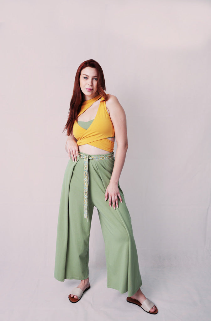 Kynuna Flare TrousersTrousersComfy brick red palazzo style culotte trousers with a dropped crotch. Ankle length with a wrap/cape design that accentuates the A-shape of the trousers and gently coGlobalistinaKynuna Flare TrousersGlobalistina