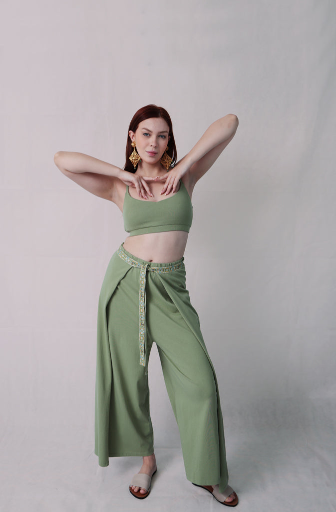 Kynuna Flare TrousersTrousersComfy brick red palazzo style culotte trousers with a dropped crotch. Ankle length with a wrap/cape design that accentuates the A-shape of the trousers and gently coGlobalistinaKynuna Flare TrousersGlobalistina