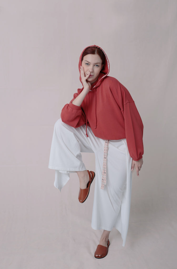 Kynuna Flare TrousersTrousersComfy brick red palazzo style culotte trousers with a dropped crotch. Ankle length with a wrap/cape design that accentuates the A-shape of the trousers and gently coGlobalistinaKynuna Flare TrousersGlobalistina