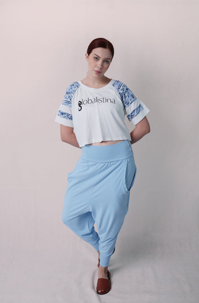 Nampa T-ShirtT-shirtVarsity style cropped t-shirt. Made from super soft organic cotton jersey, which makes it not only comfortable, but also sustainable. Features pink or blue Africa-inGlobalistinaNampaGlobalistina