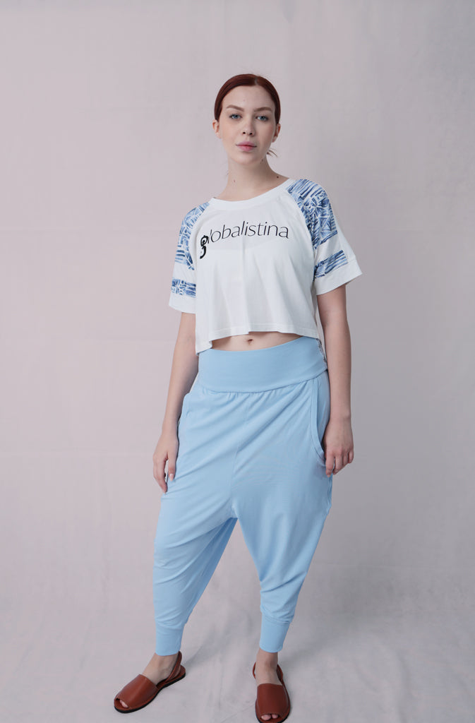 Nampa T-ShirtT-shirtVarsity style cropped t-shirt. Made from super soft organic cotton jersey, which makes it not only comfortable, but also sustainable. Features pink or blue Africa-inGlobalistinaNampaGlobalistina