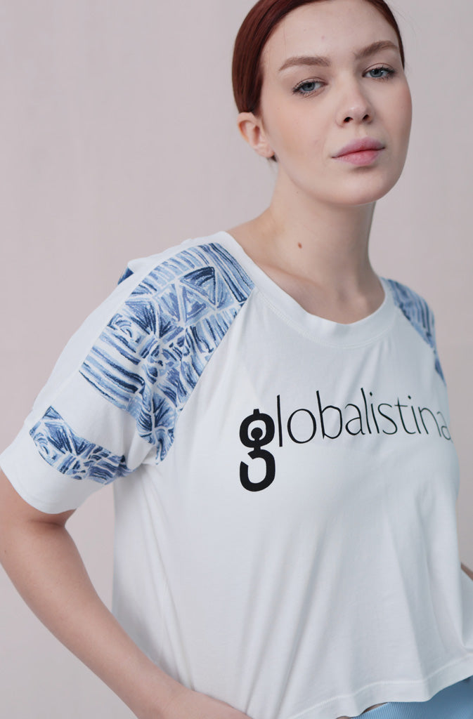 Nampa T-ShirtT-shirtVarsity style cropped t-shirt. Made from super soft organic cotton jersey, which makes it not only comfortable, but also sustainable. Features pink or blue Africa-inGlobalistinaNampaGlobalistina